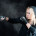 Blond boxing woman in black punching bag